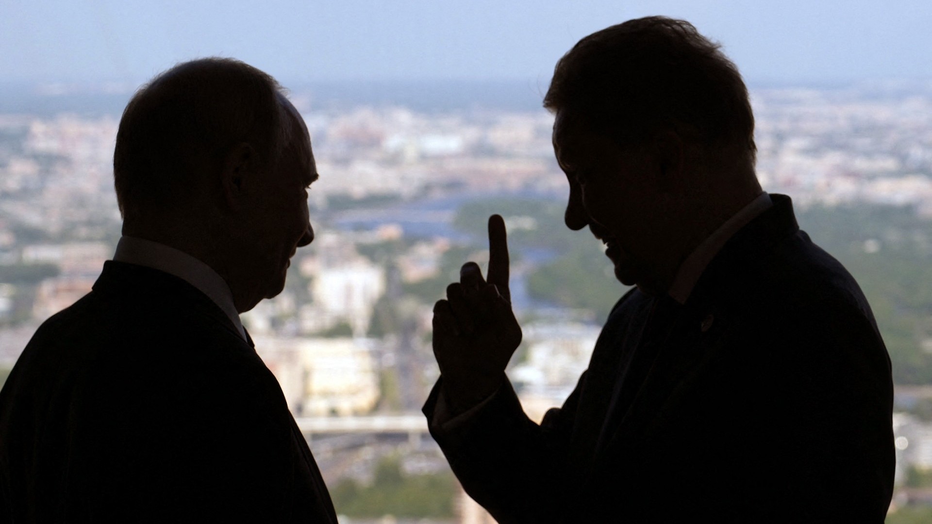 Russia’s President Vladimir Putin (L) speaks with Russia’s energy giant Gazprom CEO Alexei Miller as they visit the Lakhta Centre skyscraper, the headquarters of Russian gas monopoly Gazprom in Saint Petersburg on June 5, 2024.