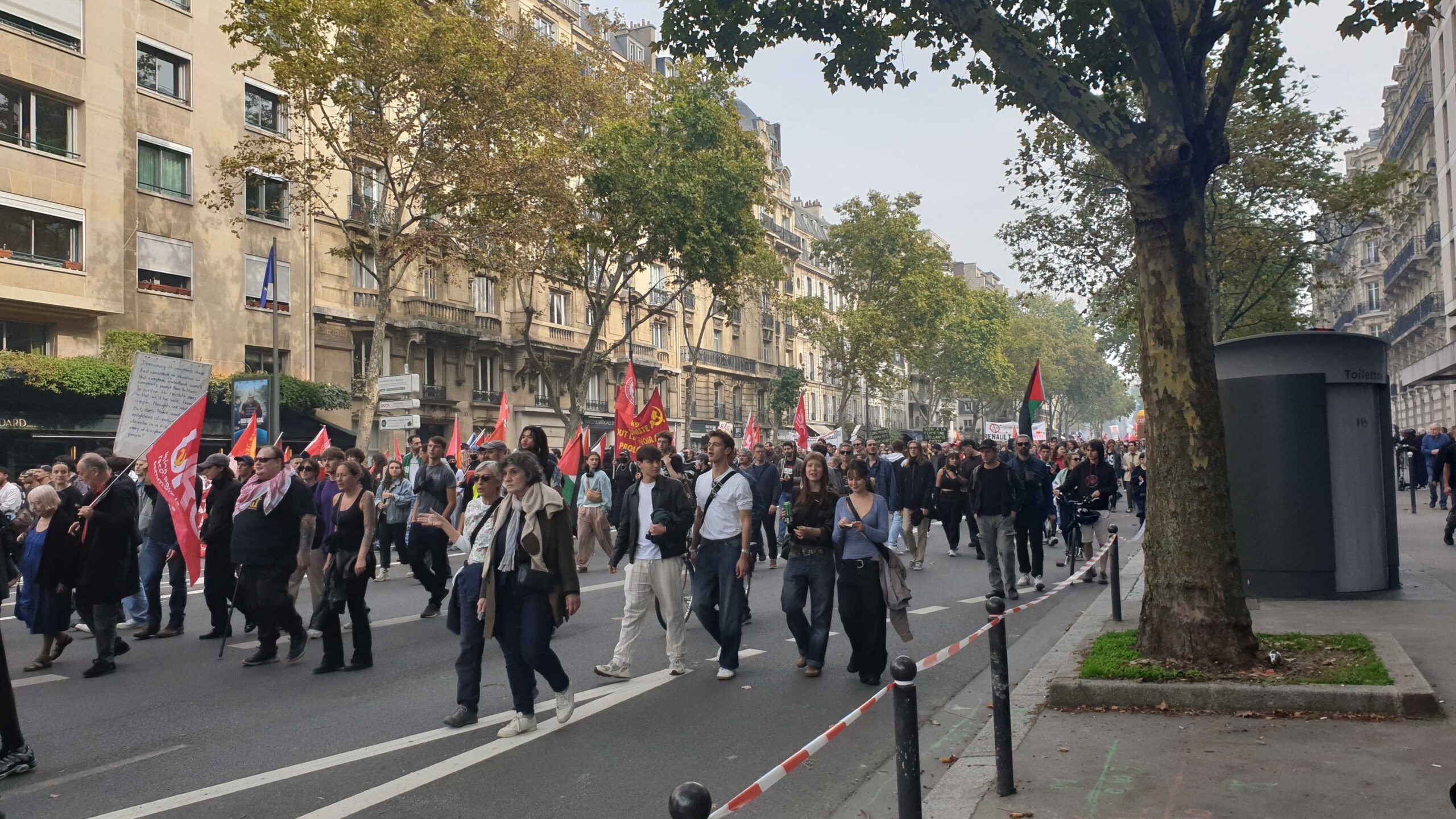 Protesters against planned austerity measures march in Paris on October 2, 2025.