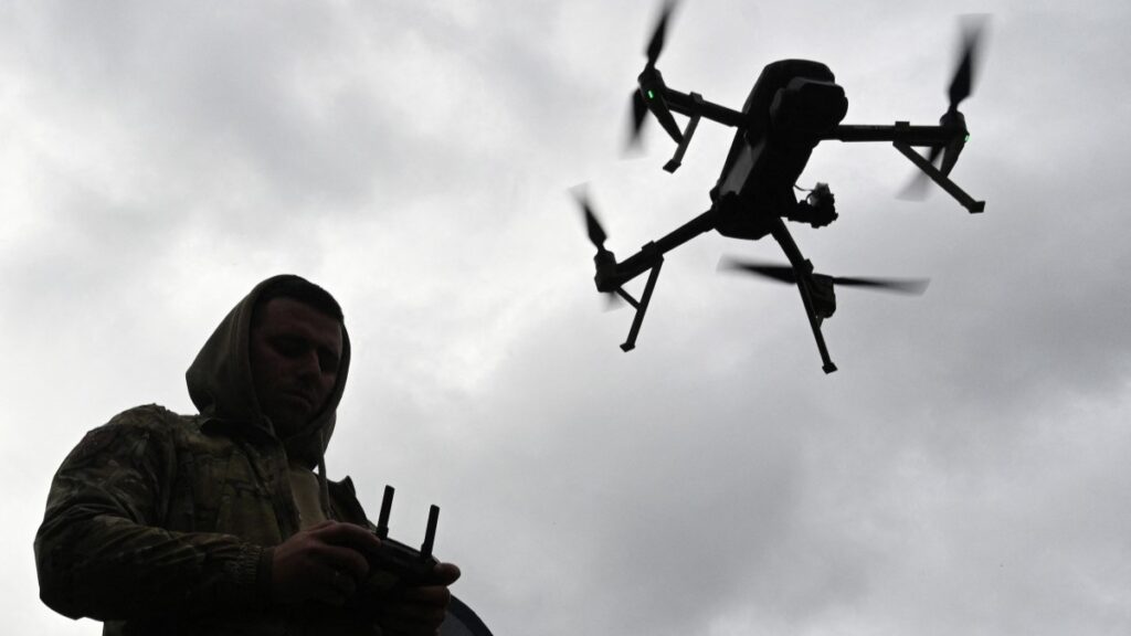 A Ukrainian serviceman operates a drone during the ‘Wild Drones’ drone racing competition, which simulates combat conditions, in Kamianets-Podilskyi, Khmelnytsky region on October 5, 2025.