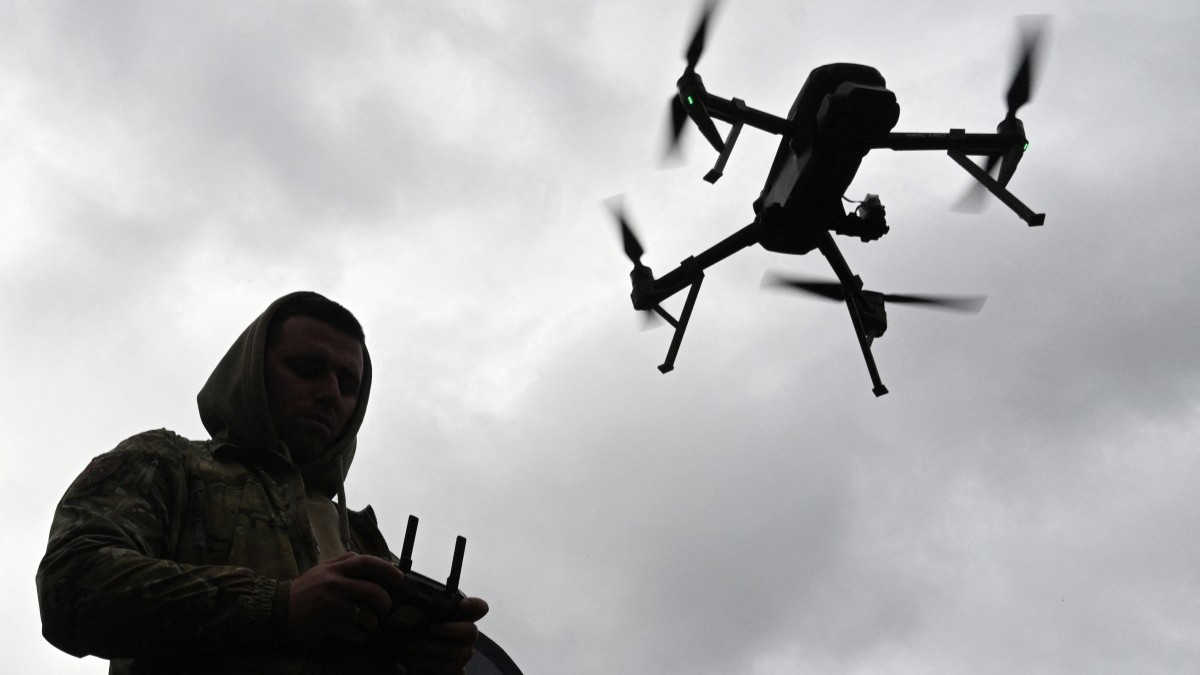 A Ukrainian serviceman operates a drone during the ‘Wild Drones’ drone racing competition, which simulates combat conditions, in Kamianets-Podilskyi, Khmelnytsky region on October 5, 2025.