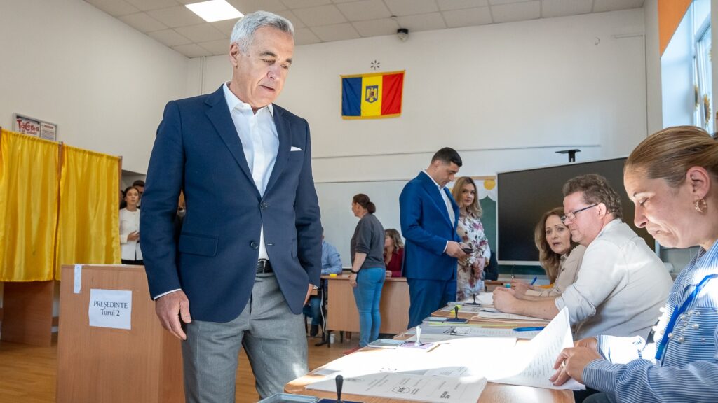 Călin Georgescu before casting his vote in the second round of Romania’s presidential election on May 18, 2025