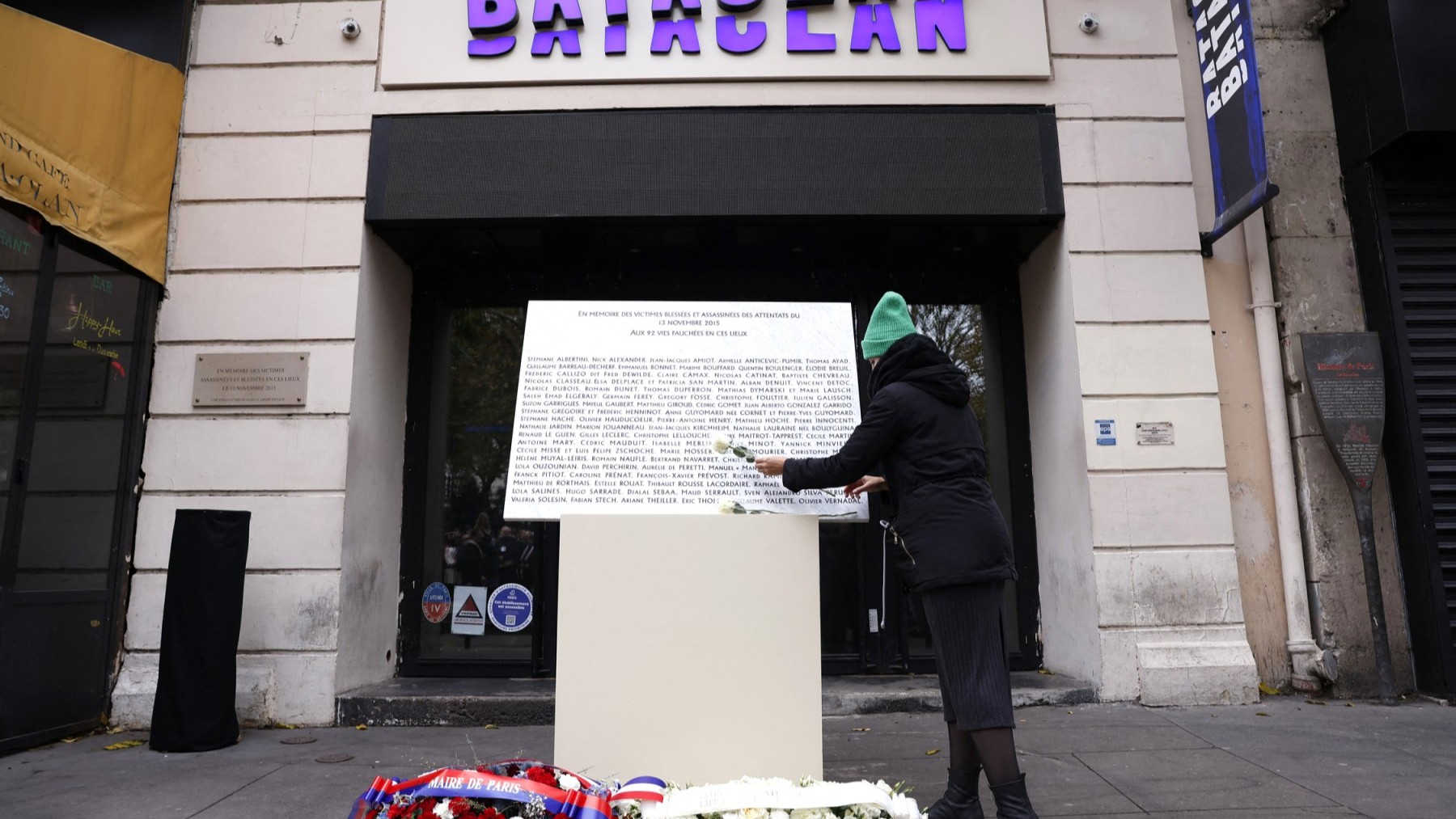 A local resident pays his respect during a ceremony at the Bataclan music hall in Paris on November 13, 2024, to pay tribute to the victims on the ninth anniversary of the Islamist terrorist attacks.