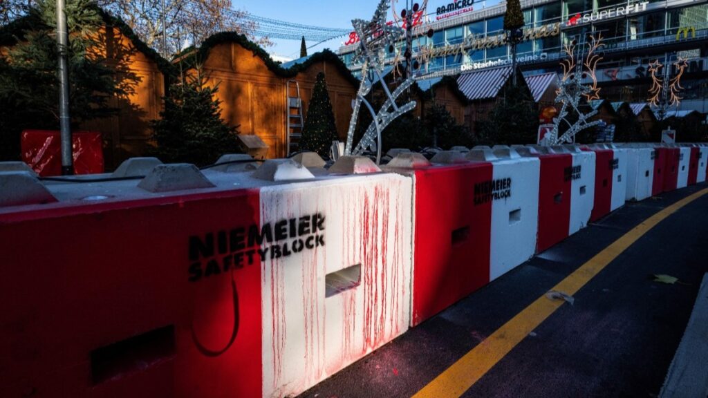 Concrete blocks line the Christmas market at Breitscheidplatz in Berlin on November 22, 2025.The traditional market, which opens on November 24, 2025, was the object of a terrorist attack in 2016 which claimed 13 lives.