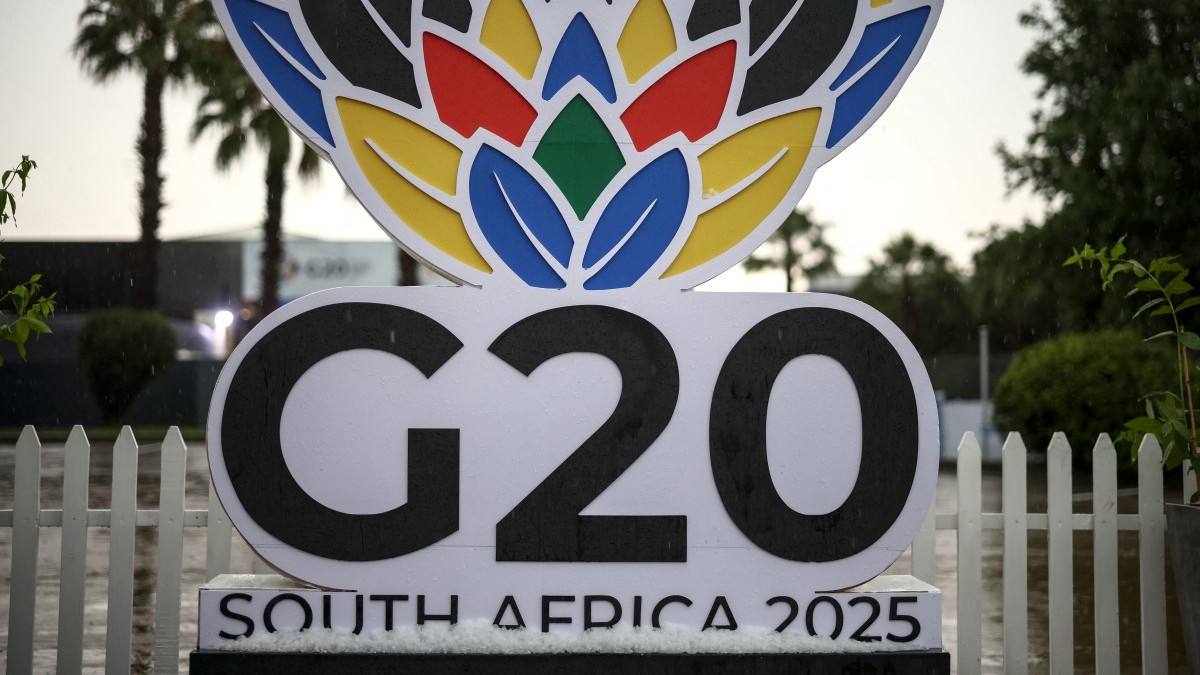 Hail lies in a sign following a thunderstorm at the G20 Leaders' Summit at the Nasrec Expo Centre in Johannesburg on November 22, 2025.