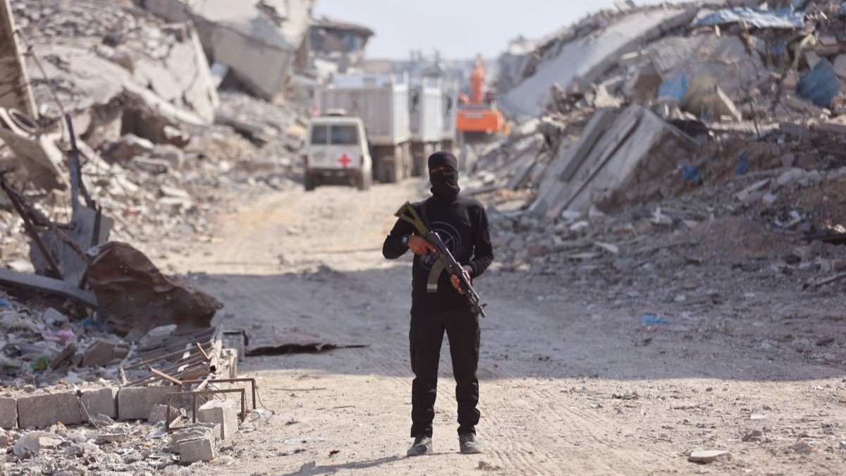A Hamas gunman in Gaza City seen as the search for the bodies of killed Israeli hostages takes place on November 2, 2025.