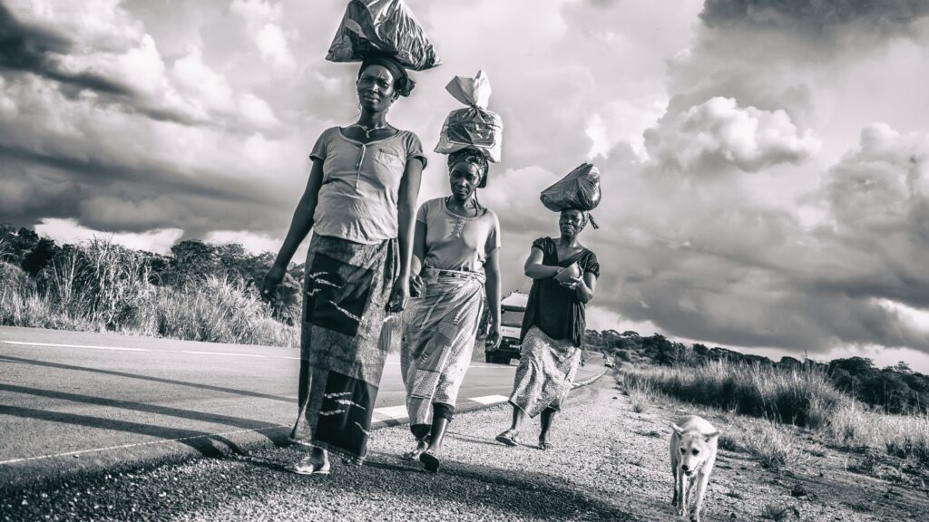 Guinean women returning from the fields at the end of the workday