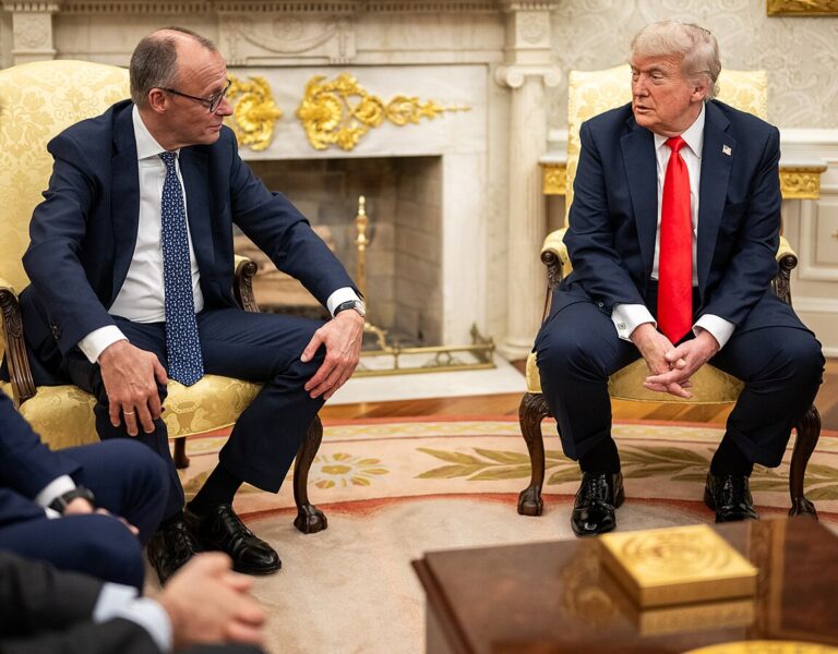 U.S. President Donald Trump shakes hands with Polish President Karol Nawrocki (L) in the Oval Office at the White House in Washington, D.C. on September 3, 2025.