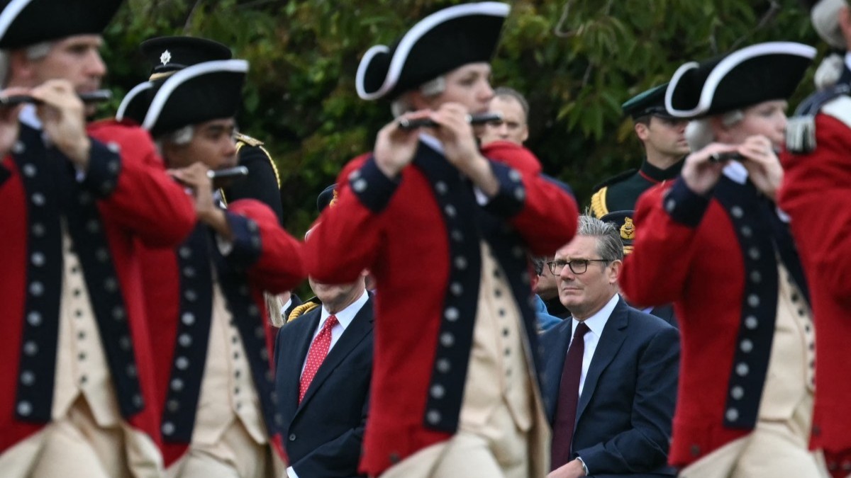 The Old Guard Fife and Drums from the U.S. Army Band march past Britain’s Prime Minister Keir Starmer during the Beating Retreat military ceremony on the East Lawn at Windsor Castle, in Windsor, on September 17, 2025, during the U.S. president's second State Visit.
