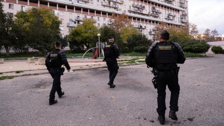 French gendarme patrol in the Les Rosiers residential complex during a major anti-drug operation in the Sainte Marthe neighborhood, northern Marseille, on December 9, 2025.
