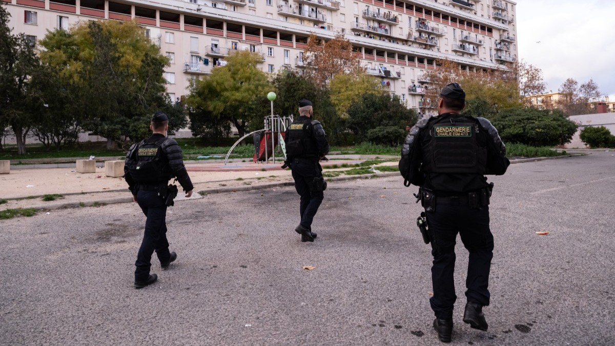 French gendarme patrol in the Les Rosiers residential complex during a major anti-drug operation in the Sainte Marthe neighborhood, northern Marseille, on December 9, 2025.