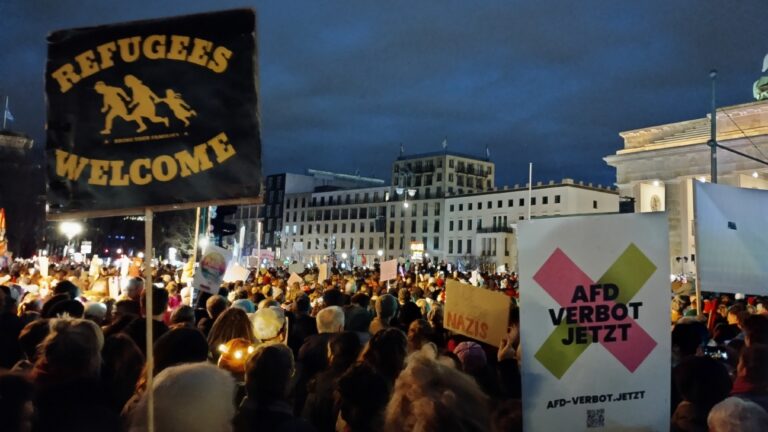 A "Refugees welcome" sign at an anti-AfD demonstration in Berlin on January 25, 2025