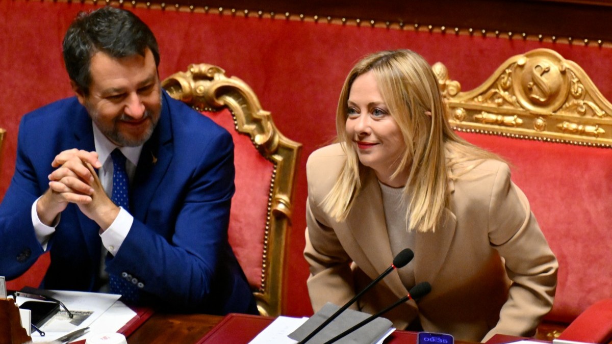 Deputy Prime Minister and Minister of Infrastructure Matteo Salvini sits next to Italy's Prime Minister Giorgia Meloni at the Italian Senate in Rome on October 22, 2025.
