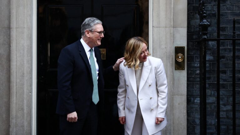 UK Prime Minister Keir Starmer (L) speaks with Italy’s Prime Minister Giorgia Meloni as he welcomes her upon arrival outside 10 Downing Street on March 2, 2025 ahead of a European leaders’ summit.
