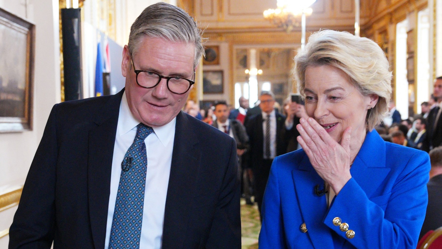 Britain’s Prime Minister Keir Starmer (L) and European Commission President Ursula von der Leyen react after hosting a joint press conference during the UK-EU Summit at Lancaster House in London on May 19, 2025.
