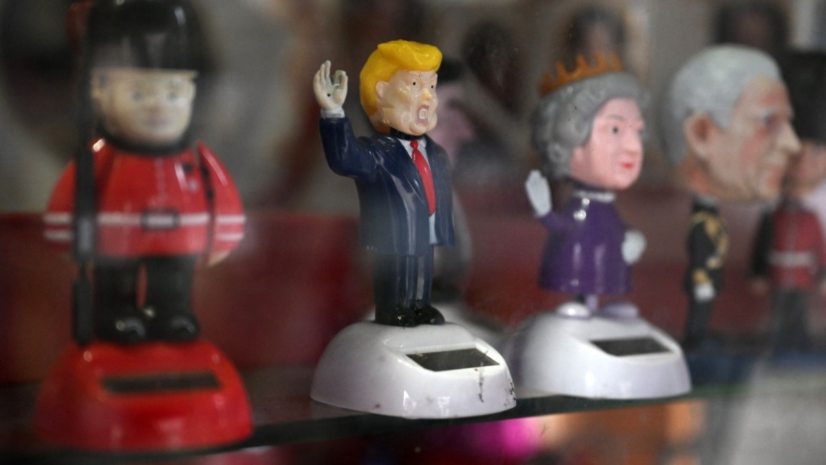 Royal-themed souvenirs alongside a Donald Trump figurine for sale near Windsor Castle, in Windsor, on September 17, 2025, during the U.S. president’s second State Visit to the UK.