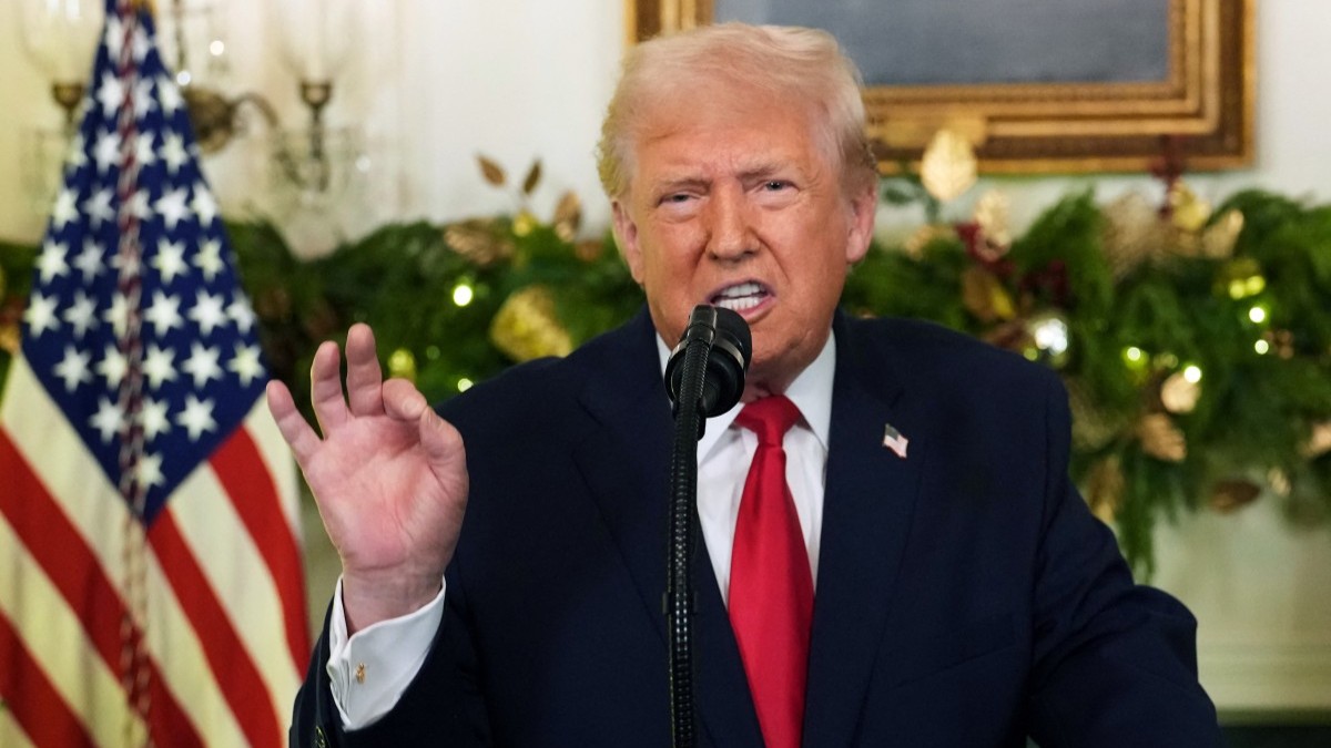 U.S. President Donald Trump addresses the nation from the Diplomatic Reception Room of the White House in Washington, D.C., on December 17, 2025.