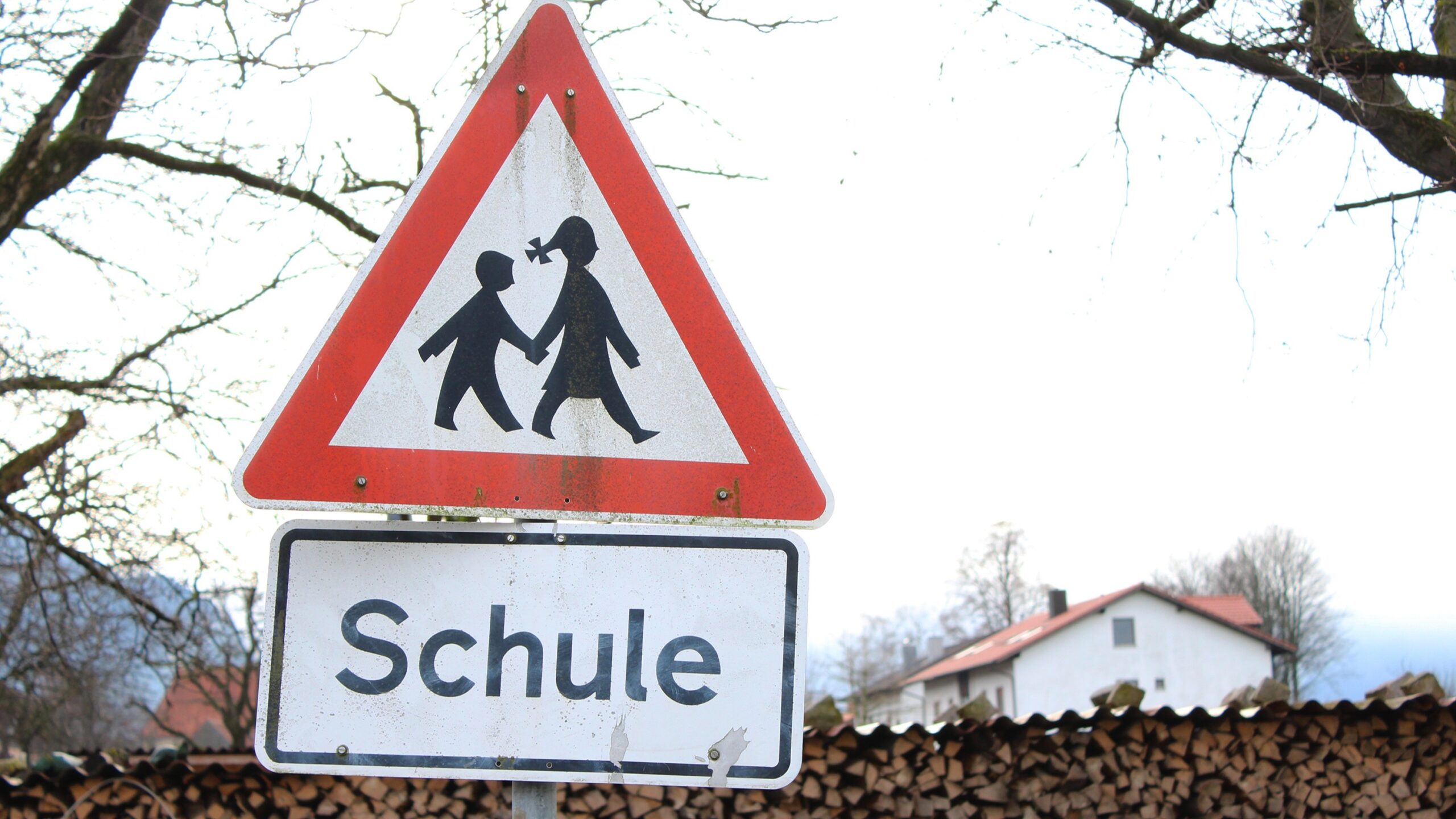 A traffic sign in Germany warning motorists that there is a school nearby