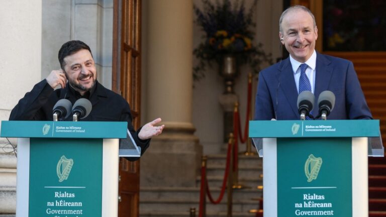 Ukraine’s President Volodymyr Zelensky (L) and Ireland's Prime Minister Micheál Martin (R) take part in a joint press conference following their meeting during his visit to Dublin on December 2, 2025.