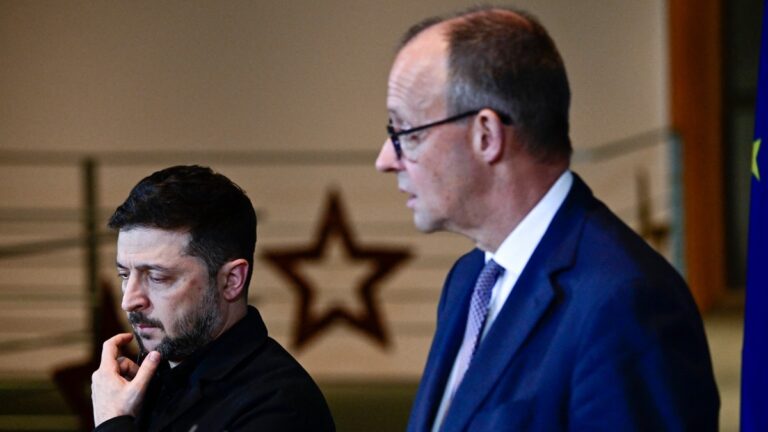 German Chancellor Friedrich Merz (R) and Ukraine’s President Volodymyr Zelensky hold a joint press conference at the Chancellery in Berlin, on December 15, 2025.
