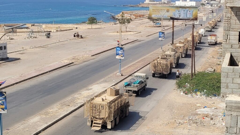 A convoy of armoured vehicles makes its way along a street in the port city Mukalla, southern Yemen, on January 1, 2026.