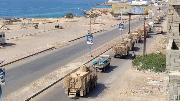 A convoy of armoured vehicles makes its way along a street in the port city Mukalla, southern Yemen, on January 1, 2026.