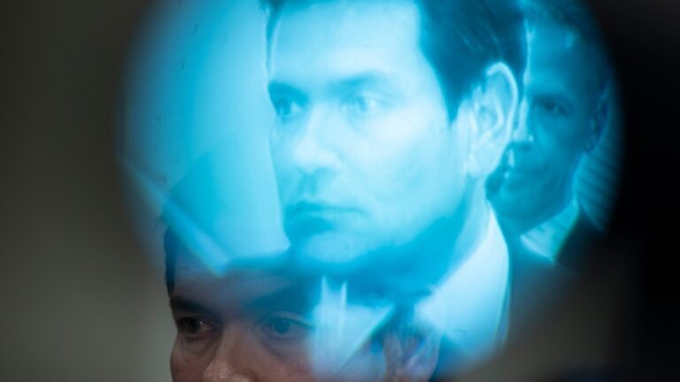 Seen through a video camera viewfinder, U.S. Secretary of State Marco Rubio speaks to reporters after he and top Trump administration officials briefed Senators on U.S. military actions in Venezuela, on Capitol Hill in Washington, D.C. on January 7, 2026.