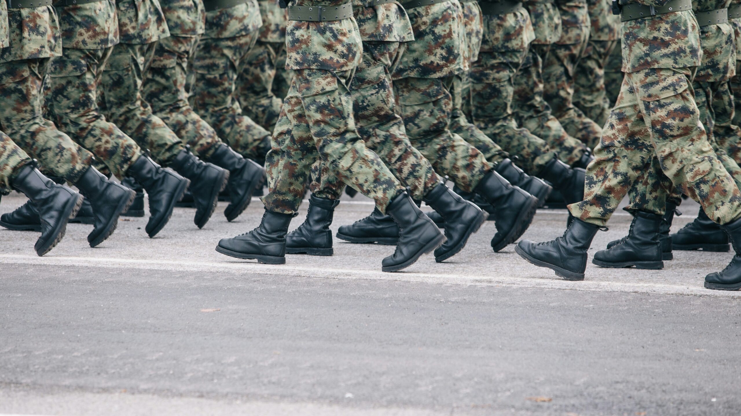 Soldiers marching boots illustration pro-war position (Unsplash)