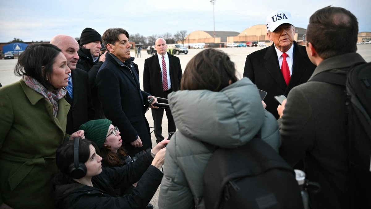 U.S. President Donald Trump speaks to the press upon returning to Joint Base Andrews in Maryland on January 13, 2026.