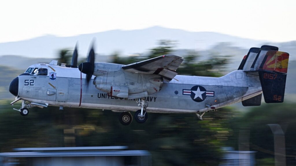 A U.S. Navy C-2A Greyhound approaches to land at Luis Muñoz Marín International Airport on December 30, 2025 in Ceiba, Puerto Rico.