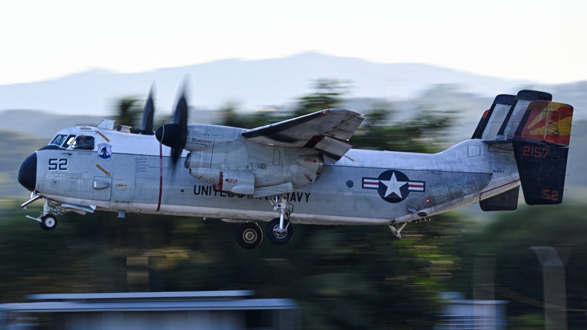 A U.S. Navy C-2A Greyhound approaches to land at Luis Muñoz Marín International Airport on December 30, 2025 in Ceiba, Puerto Rico.