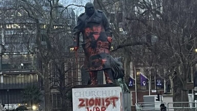 The defaced memorial to Winston Churchill in Parliament Square, London on February 27, 2026