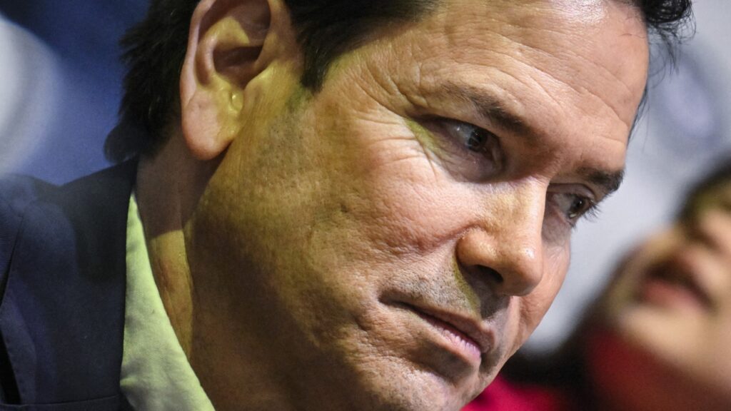 U.S. Secretary of State Marco Rubio attends the women’s preliminary round Group A Ice Hockey match between the U.S. and the Czech Republic at the Milano Rho Ice Hockey Arena during the Milano Cortina 2026 Winter Olympic Games in Milan, on February 5, 2026.