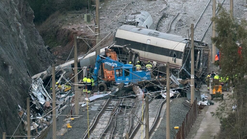 Emergency services and investigators work on the site of a high-speed trains collision that killed at least 42 people, in Adamuz, southern Spain, on January 20, 2026.