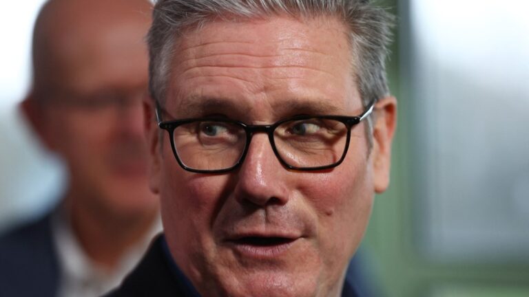UK Prime Minister Keir Starmer talks with members of the audience after delivering a speech at Horntye Park Sports Complex, in St Leonards-on-Sea, south east England, on February 5, 2026.
