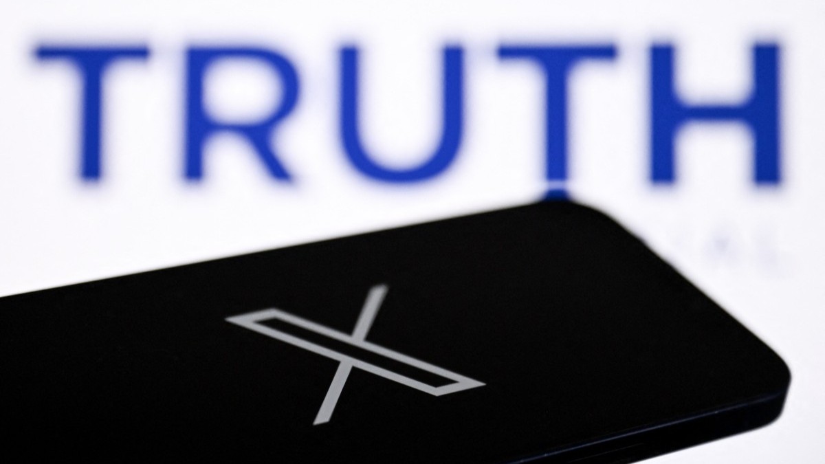The logo of X seen on a smartphone screen in Frankfurt am Main, and the logo of TRUTH social networking platform on a laptop screen.