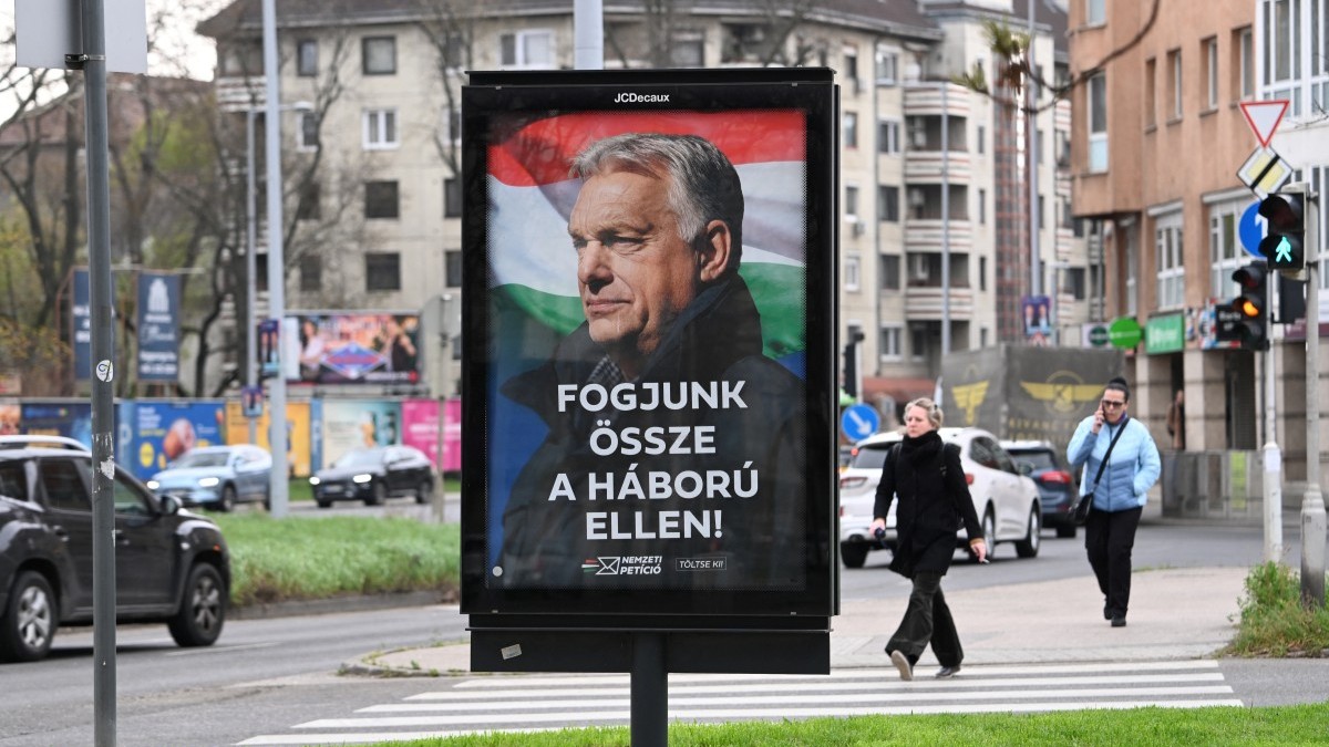 A billboard featuring a portrait of Hungarian Prime Minister Viktor Orbán with the text reading “Let’s join forces against the war, is seen in Budapest on March 27, 2026, ahead of the parliamentary elections on April 12, 2026.
