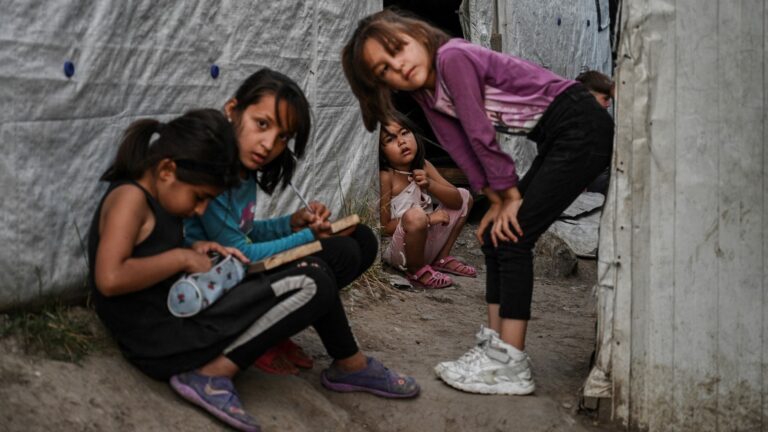 Children pictured in a improvised tents camp near the refugee camp of Moria in the island of Lesbos on June 21, 2020