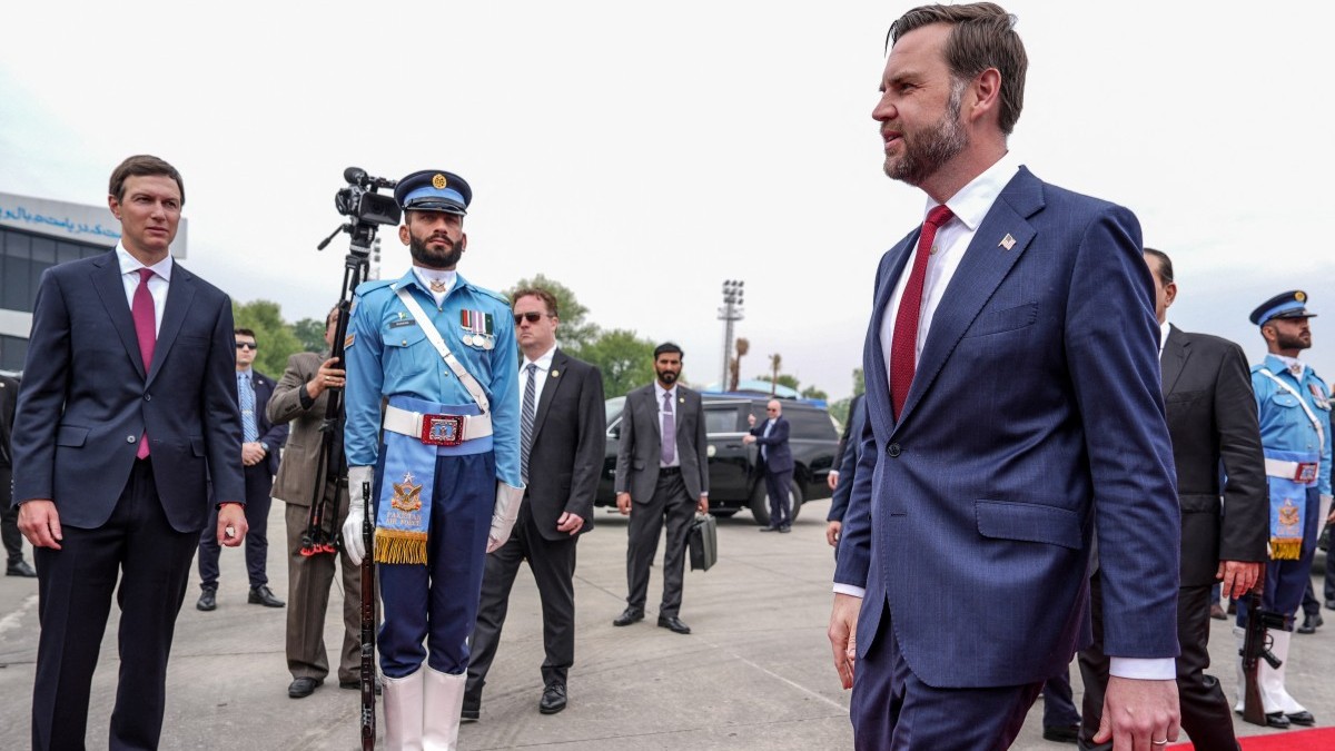 U.S. Vice President JD Vance (R) walks as U.S. President Donald Trump’s son-in-law Jared Kushner (L) watches upon their arrival for U.S.-Iran peace talks in Islamabad on April 11, 2026.