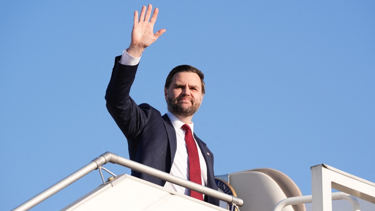 U.S. Vice President JD Vance waves as he boards Air Force Two after attending talks on Iran in Islamabad on April 12, 2026.