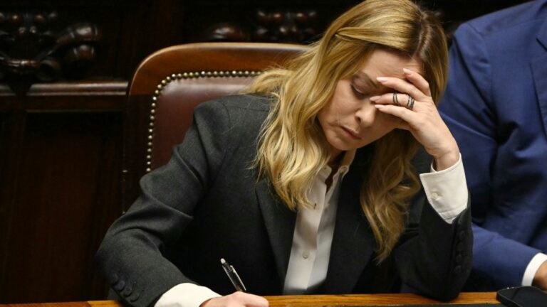Italy’s Prime Minister Giorgia Meloni takes notes at the lower house of the Italian Parliament, in Rome on April 9, 2026.