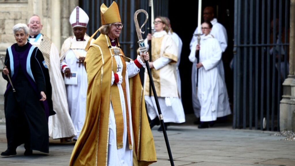 Archbishop of Canterbury Sarah Mullally smiles as she departs following her installation ceremony at Canterbury Cathedral, south-east England on March 25, 2026.