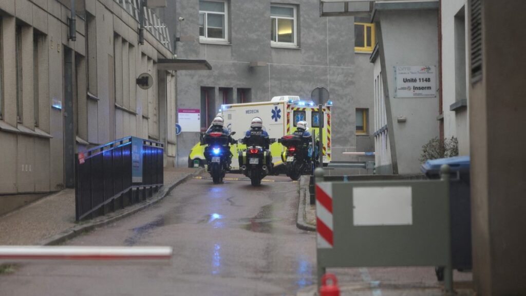 Ambulances transporting French national passengers of the MV Hondius, where an outbreak of hantavirus has been detected, arrive at the Bichat hospital in Paris on May 10, 2026, after a plane repatriating them landed in Le Bourget airport, in the outskirts of Paris.