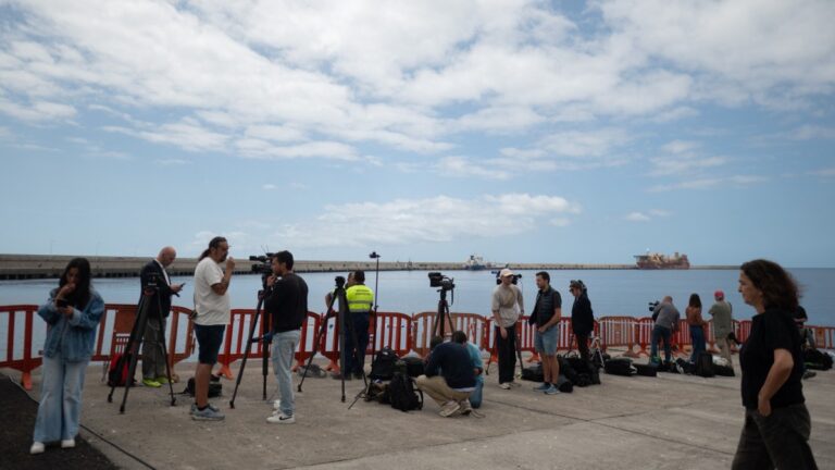 Media wait for the arrival of the cruise ship MV Hondius at the port of Granadilla de Abona on the island of Tenerife in Spain's Canary Islands on May 9, 2026.