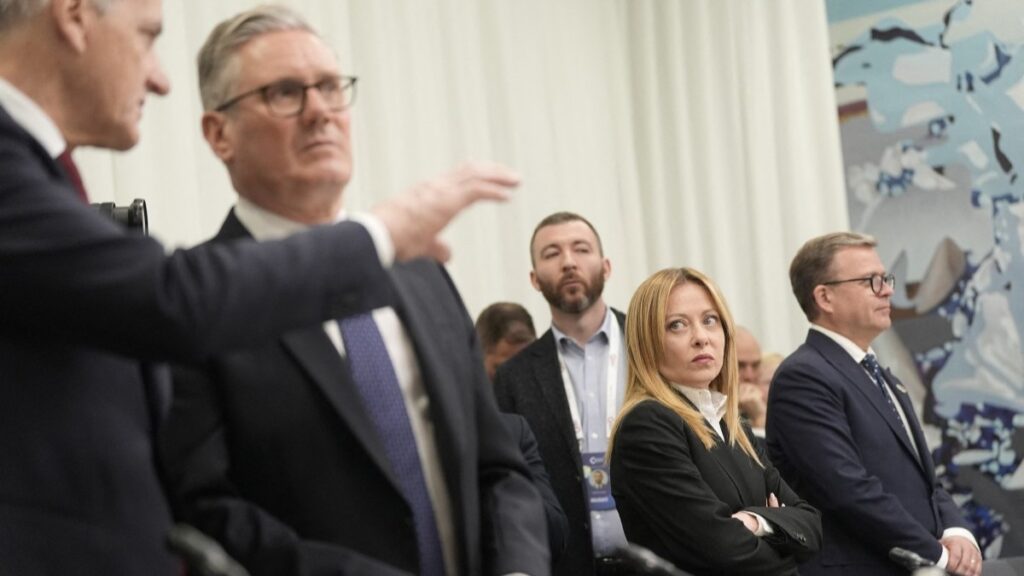 Italian Prime Minister Giorgia Meloni (R) looks on as Norwegian Prime Minister Jonas Gahr Støre (L) and British Prime Minister Keir Starmer (2ndL) converse during the 8th European Political Community (EPC) summit in Yerevan on May 4, 2026.