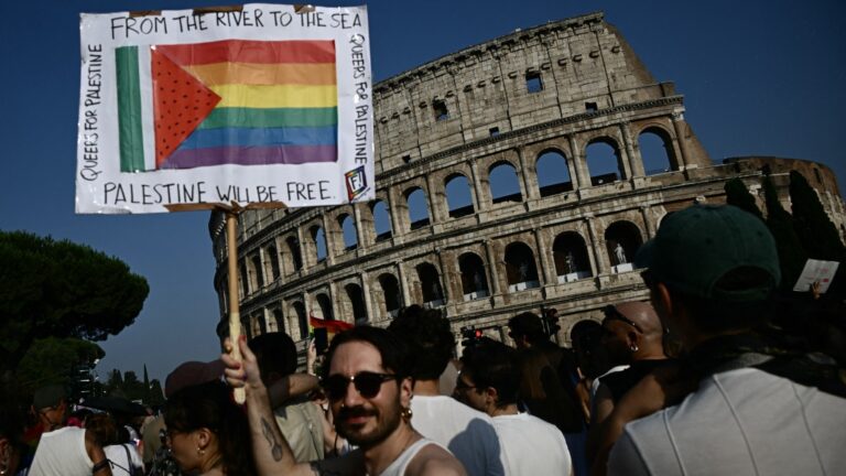 People take part in the Rome Pride Parade in support of LGBTQ rights near the Colosseum in Rome on June 14, 2025.