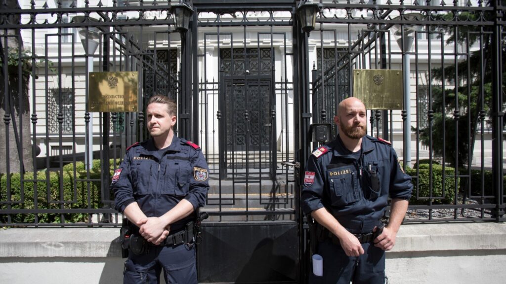 Austrian police stand guard in front of the Russian embassy in Vienna during a protest of members and supporters of the Chechen community on July 07, 2020.
