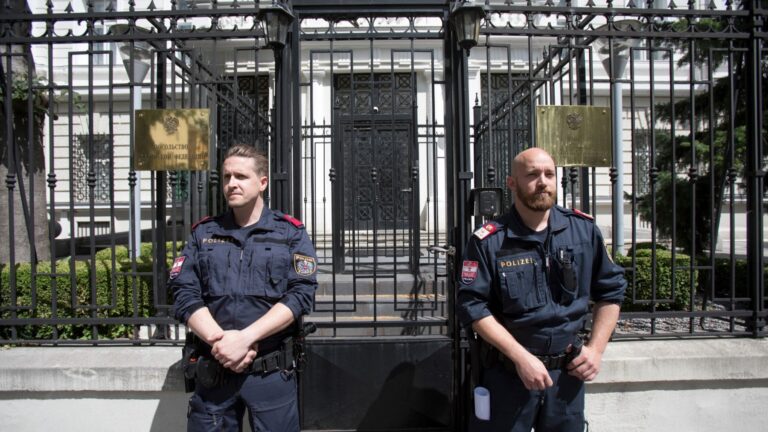 Austrian police stand guard in front of the Russian embassy in Vienna during a protest of members and supporters of the Chechen community on July 07, 2020.