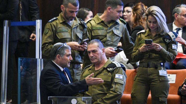 Head of the Shin Bet domestic security agency Maj Gen David Zini (bottom L) speaks with Israel’s army chief, Lieutenant General Eyal Zamir, as they arrive to the Israeli parliament, the Knesset, ahead of an address by the U.S. president in Jerusalem on October 13, 2025.
