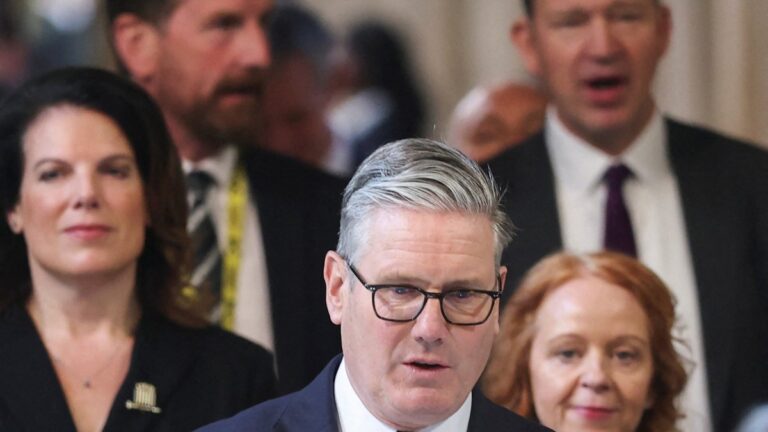 Britain’s Prime Minister Keir Starmer (C) returns to the House of Commons after listening to the king's speech during the State Opening of Parliament at the Palace of Westminster in London on May 13, 2026.