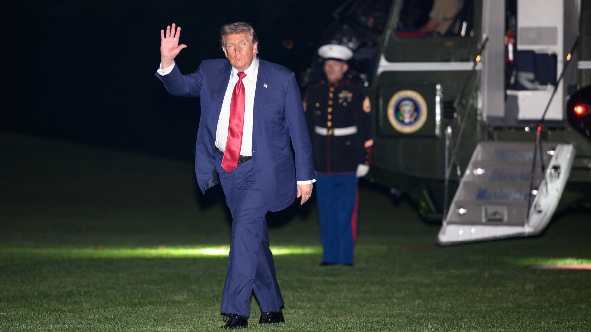 U.S. President Donald Trump waves as he walks across the South Lawn upon returning to the White House in Washington, D.C., on May 8, 2026.